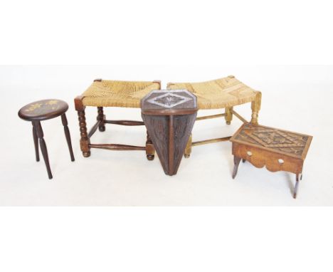 An early 20th century oak Art Nouveau wall bracket of tapering form, carved with stylised foliage, 42cm long, along with a sm