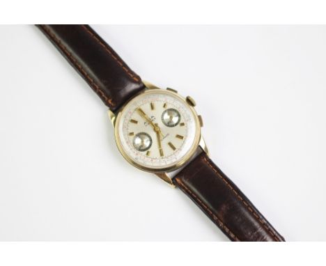 A 9ct gold Avia chronograph wristwatch, the circular baton dial with two further outer scales and two subsidiary dials, dial 