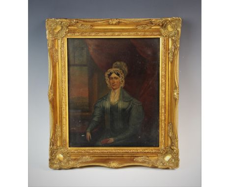 English school (19th century),  Oil on board,  Half length portrait of a seated lady in a bonnet,  Unsigned,  29cm x 24cm,  G