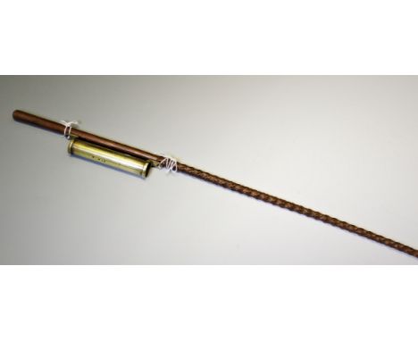 A vintage driving crop, of naturalistic texture, 177cm long, along with a brass cylindrical whip holder,20cm long (2)