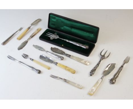 A silver handled Kings pattern bread fork, E L Thompson & Co, Sheffield 1898, cased, and a further selection of six forks, wi