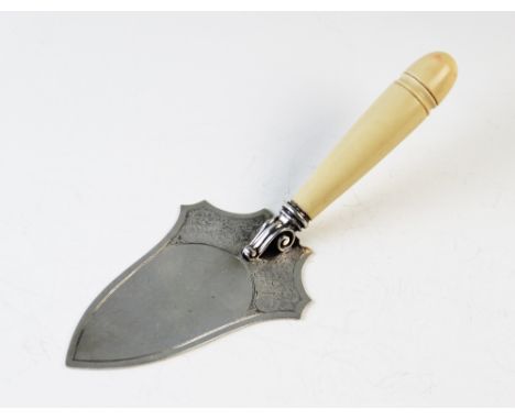 A silver bladed presentation trowel, Turner & Simpson, Birmingham 1931, un-engraved and with turned ivory handle, 24.5cm long