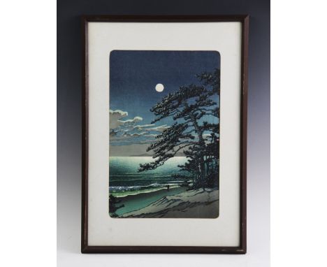 Kawase Hasui (1883-1957), Japanese wood block print depicting spring moon at Ninomiya Beach, 36cm x 23.5cm, Framed and glazed