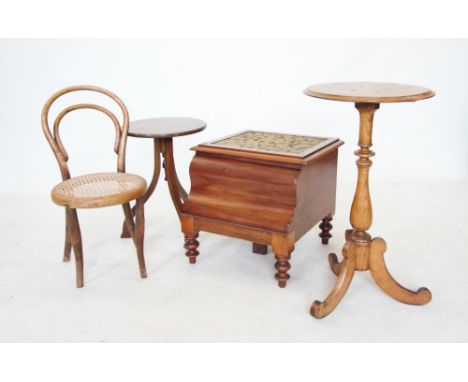 A Victorian mahogany circular occasional table, on a baluster ring turned pedestal with three down swept supports, 67cm high,