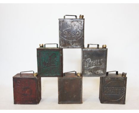 A collection of six vintage petrol cans, including Air Ministry, Pratts, Esso and Shell, some replacement caps, 31cm high 