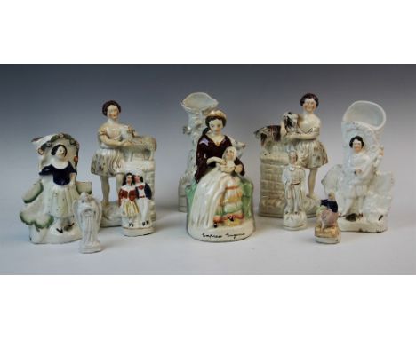 A group of Staffordshire flatback figures, 19th century and later, to include: a portrait figure of Empress Eugenie, modelled