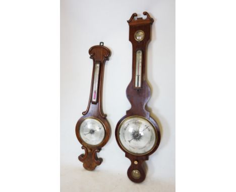 A mid 19th century walnut banjo wall barometer, the onion shaped top with 'C' scroll moulded detail, above a thermometer on a