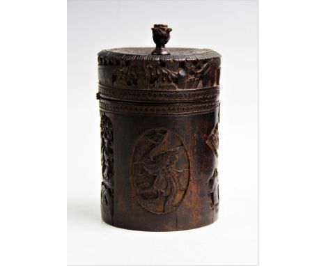 A Chinese carved bamboo tea caddy, Canton, 19th century, of cylindrical form with hinged cover engraved with auspicious round