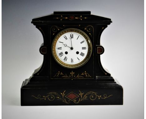 A Victorian slate mantel clock, the architectural case with incised gilt highlights and rouge marble inlay, enclosing the 13c