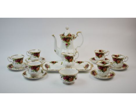 A Royal Albert Old Country Roses six place tea service, comprising; six tea cups, six saucers, a milk jug, a sucrier, a sandw