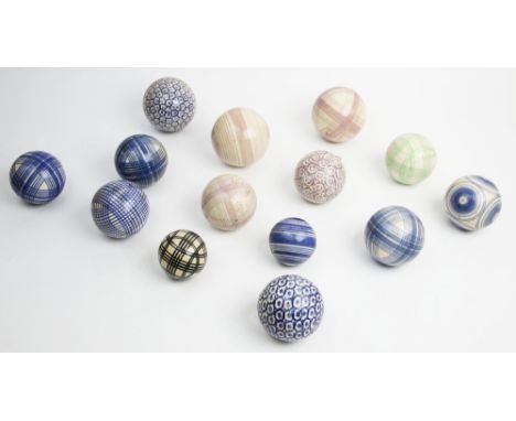 Eight Victorian 'Scottish' tartan pattern ceramic carpet bowls, late 19th century, the bowls of various sizes and colours, wi