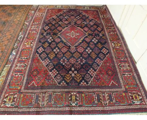 A vintage handmade Joshagan carpet, 128" x 89"