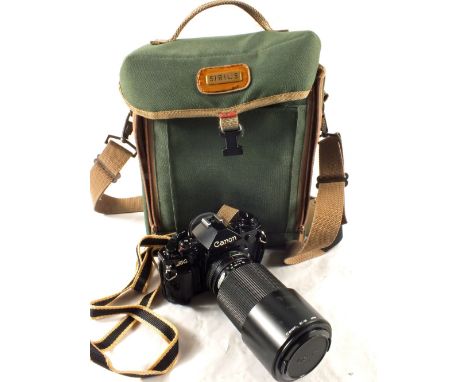 A Canon A1 camera and 70/210 lens