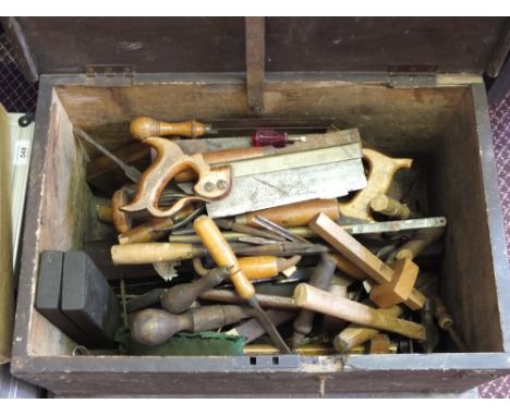 A Pine tool box containing woodworking tools
