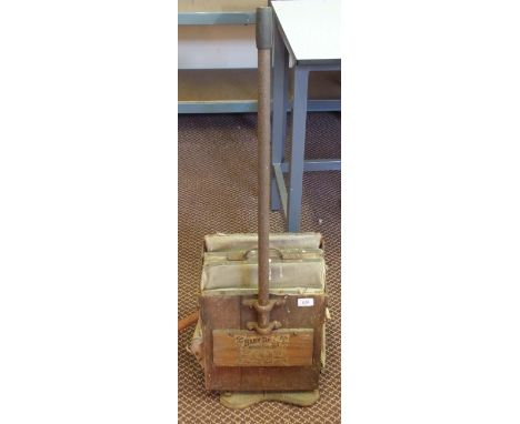 A vintage Baby Daisy hand vacuum hoover