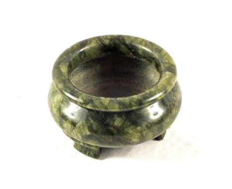 A small Chinese Jade censer on three feet, spinach green in colour, diameter 4"