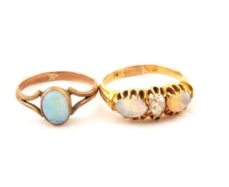 A 9ct Gold single set Opal ring plus a Gold ring set with two Opals and a clear Topaz