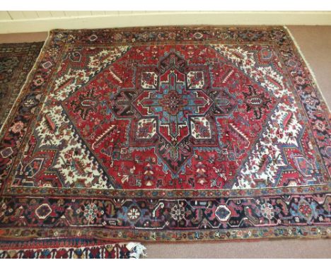 A vintage Persian handmade Heriz carpet, 118" x 90"
