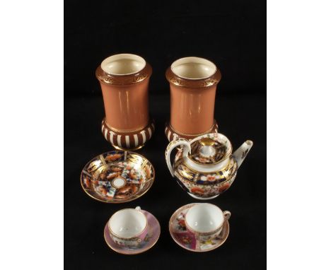 Two miniature Dresden cup and saucers, a Derby teapot and stand and a pair of MacIntyre vases