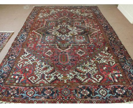 A vintage Persian handmade Heriz carpet, 146" x 117"