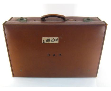 An Army and Navy Stores vintage leather suitcase with leather strip reinforced seams and cotton twill lining. 62x41x17cm. 