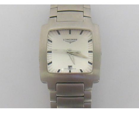 Longines, a stainless steel manual wind wristwatch, the square silvered dial with baton numerals and tapering hands, and date