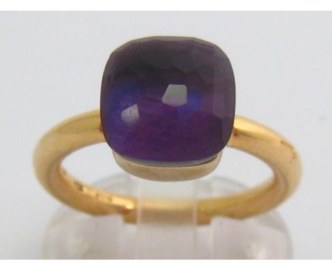 Pomellato, ‘Nudo Classic’, an 18 carat gold and amethyst ring, the cushion shaped faceted stone 10.2mm, the shank signed to t