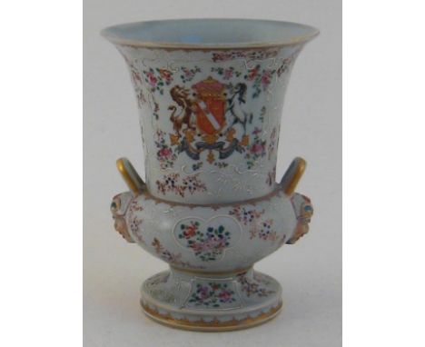 A Samson campana shape porcelain vase in the Chinese export armorial manner with two loop handles over Chinese masks, white t