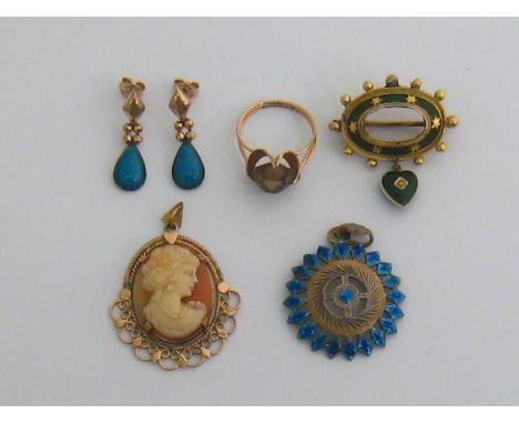 A mixed lot of jewellery, including a 19th century gold (tests 15 carat) and enamel brooch (AF), 6.6gms; a quartz dress ring,