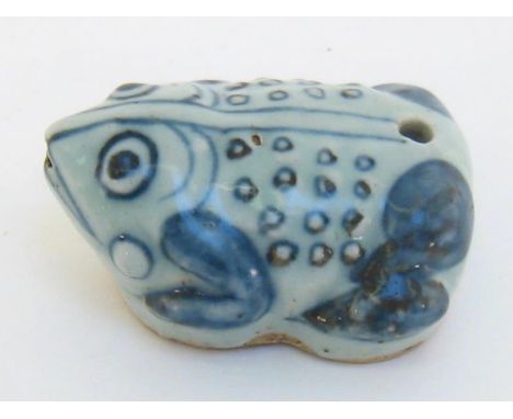 A Chinese blue and white ceramic water dropper in the form of a toad. Length 8cm. 