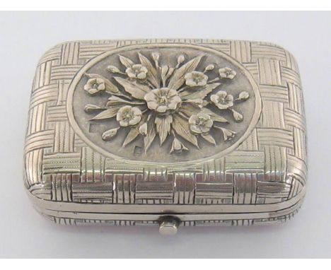 A Russian silver box by Matvyeo Nikiforov, Moscow, 1880, also bearing later French control marks, oblong with rounded corners