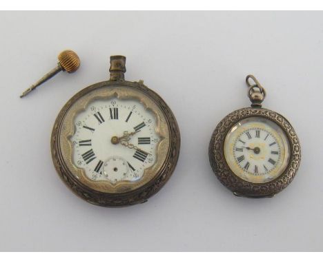 A late 19th century Swiss silver fob watch, the four-piece case stamped 935, triple bear stamp, the ornate white enamel dial 