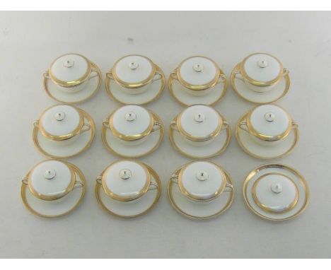 A set of Crescent white china two handled chocolate pots with gilt rims by George Jones & Sons for Harrods, comprising eleven