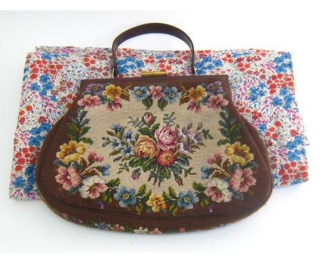 A needlepoint tapestry handbag, brown art silk lined with internal zip pocket, leather handle and trim. 40x28cm. 