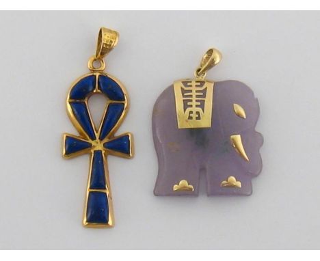 An Egyptian gold and lapis Ankh pendant, with Egyptian standard marks, 3.4cm long, 4gms; together with a jade elephant pendan