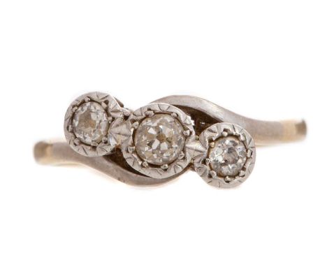 the illusion set diamonds totalling approximately 0.40 carats, marked 18CT, size K 1/2, 2.8g