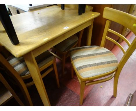 Light wood kitchen table and four chairs