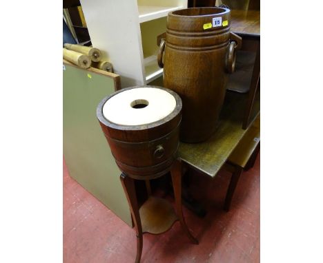 Planter stand with barrel shaped planter and a wooden stickstand