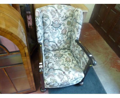 Re-upholstered vintage armchair