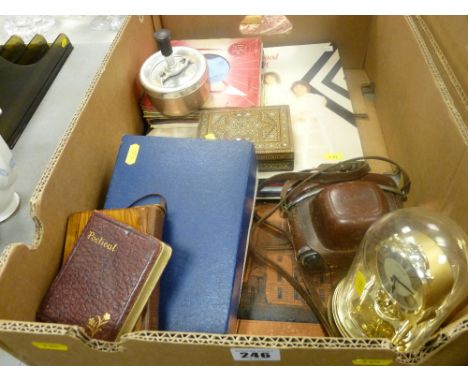 Box of assorted collectables including old Kodak camera, 45rpm records, dome clock etc