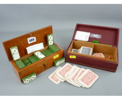 Vintage box of green coloured dominoes and a further box of markers and playing cards