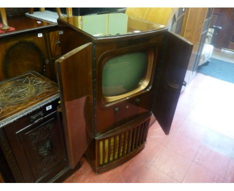 Vintage Alba television housed in a walnut cabinet