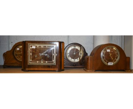 A Garrard arch top Westminter chime mantel clock; others including a 1930's Art Deco oak sunburst mantel clock, an Enfield sq
