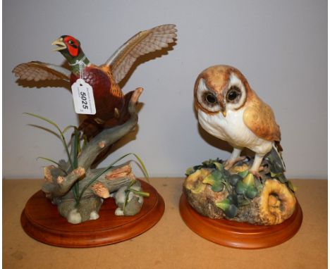 A Royal Crown Derby model of a Barn Owl, painted by CM Fahy, signed to base, first quality, wooden base; a Franklin Mint mode