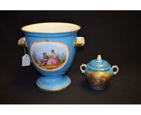 A 19th Century French two handled ice pail, painted with gilt oval cartouches of courting  couples in period dress, on a bleu