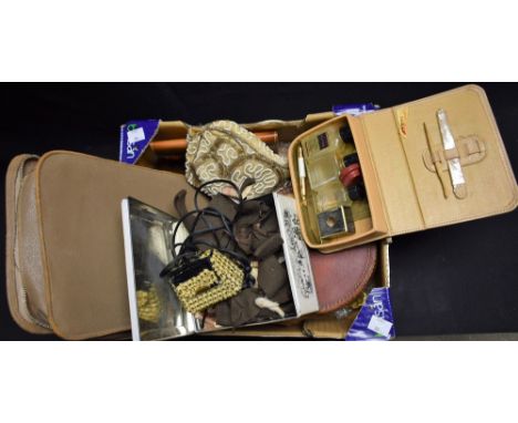 A leather collar box; an enamel brush set; etc.