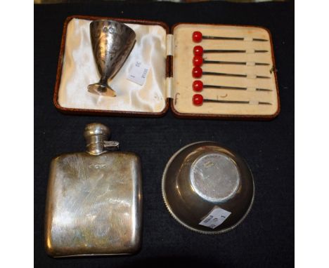 A silver hip flask, Chester 1936; a set of six silver cocktail sticks, Birmingham, cased; a silver bowl, etc