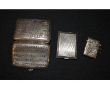 A silver vesta case, Birmingham 1919; a cigarette case, Birmingham 1909; a matchbook case, Chester (3) 120g gross