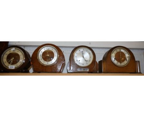 A Smiths Enfield Westminster chime oak arch top mantel clock; others including a Garrard, etc (4)