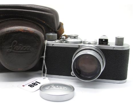 Leitz - Leica Camera Numbered Z01658, with Summicron f=5cm No 1040257 in Leica leather case, some damage to leather case.